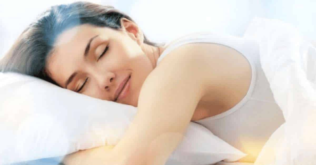 woman sleeping peacefully with fresh, clean air circulating