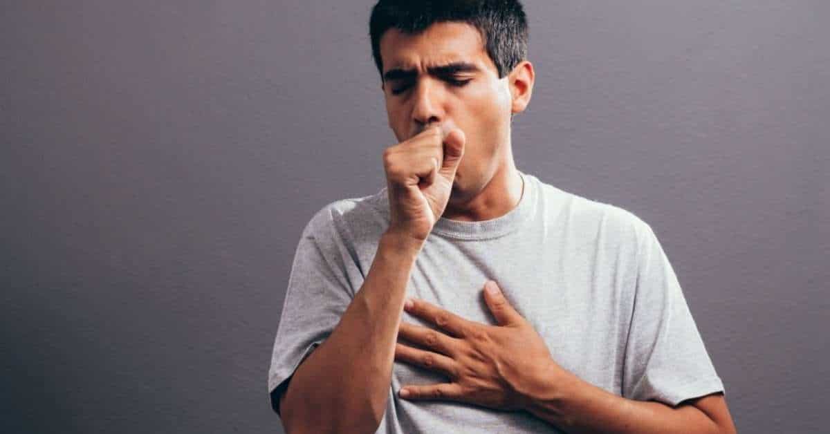 A person having coughing problems