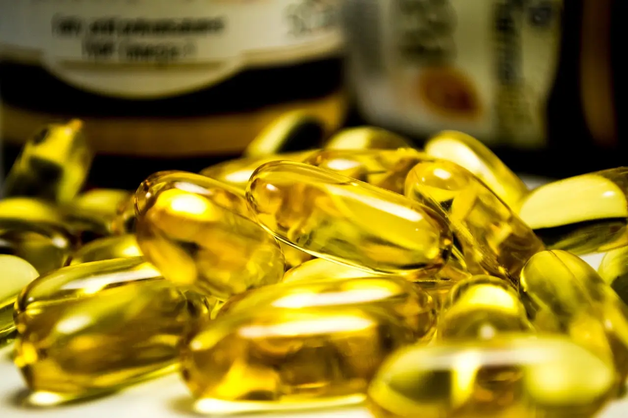 Close-up of Yellow Soft Gel Capsules in a Pharmaceutical Setting