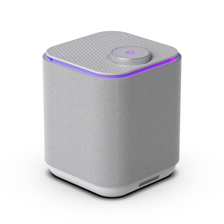 A compact white smart speaker with a textured mesh design and a glowing purple LED light on the top edge.